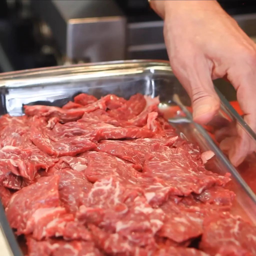 B&oelig;uf aux oignons au wok