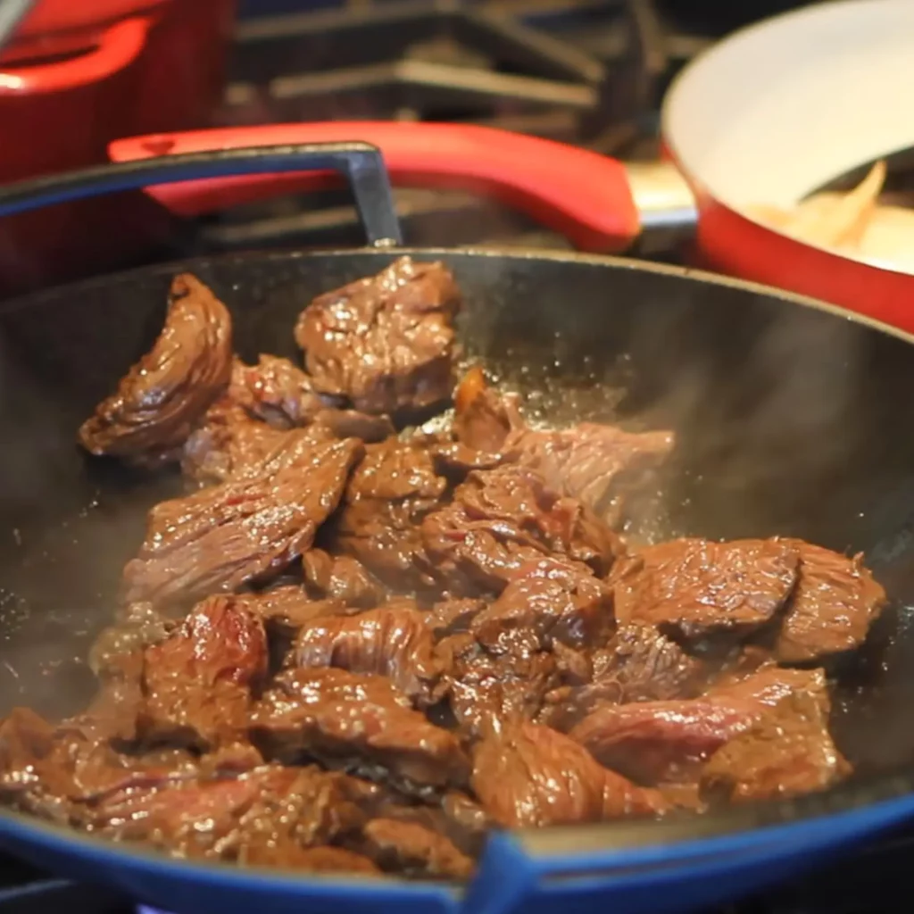 B&oelig;uf aux oignons au wok