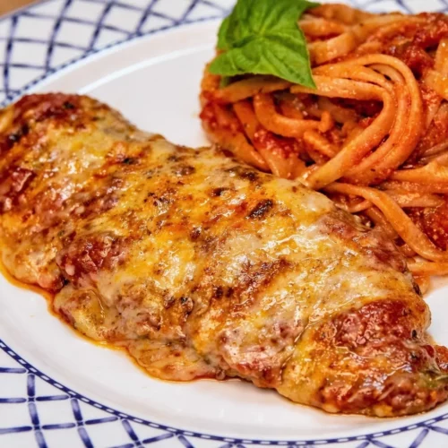 Escalopes de veau parmigiana &agrave; la sauce tomate et mozzarella