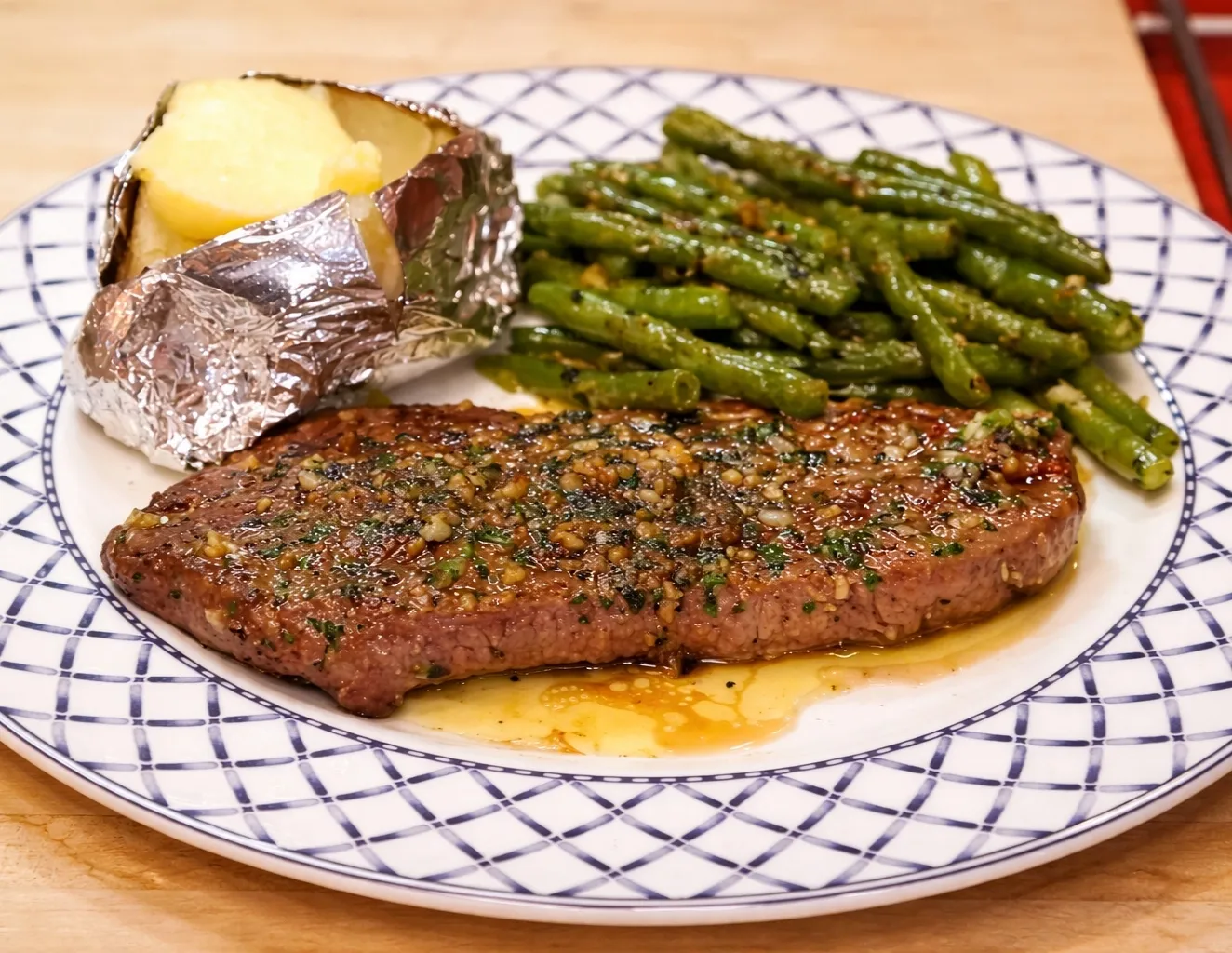 Budget Steak with Baked Potato and Garlic Butter