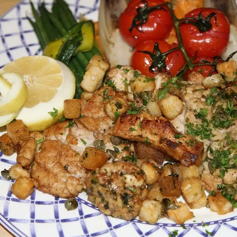 Cervelle de veau à la grenobloise, citron, câpres et croûtons