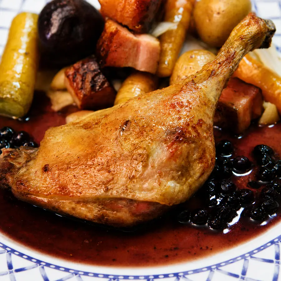 roasted duck legs maple blue cheese sauce, finished dish