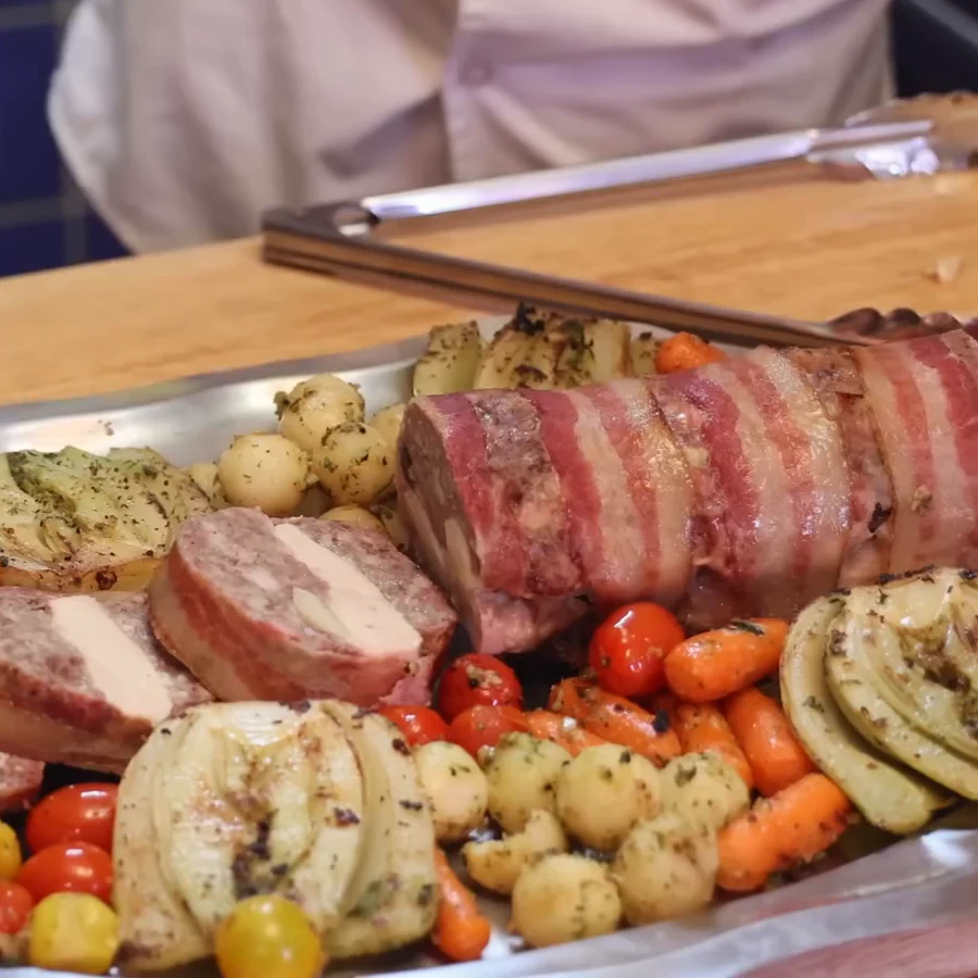 bacon wrapped three meat meatloaf, finished dish