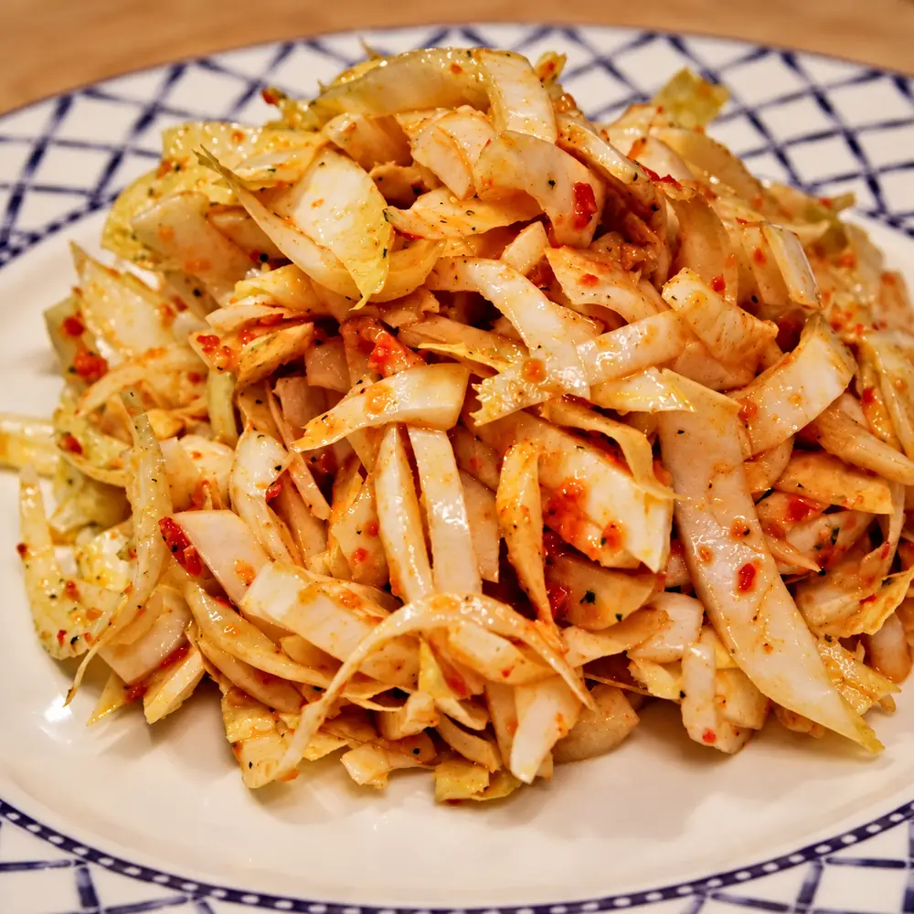 belgian endive salad sun dried tomato dressing, finished dish