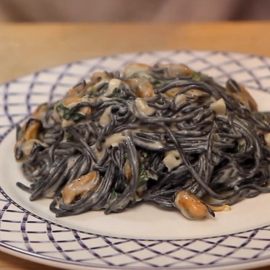 black capellini mussels garlic cream, finished dish