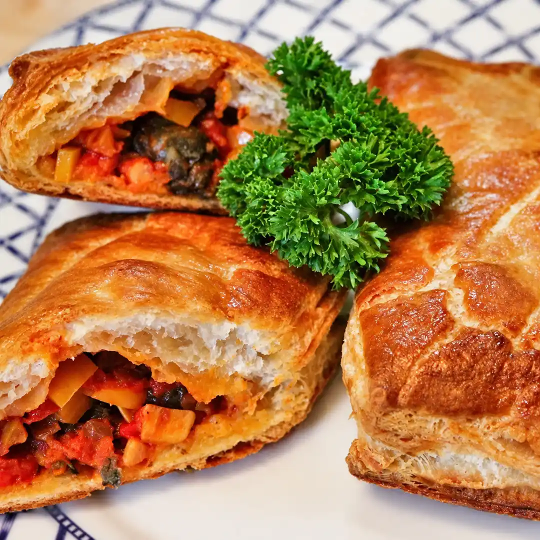 escargot puff pastry peppers tomato, finished dish