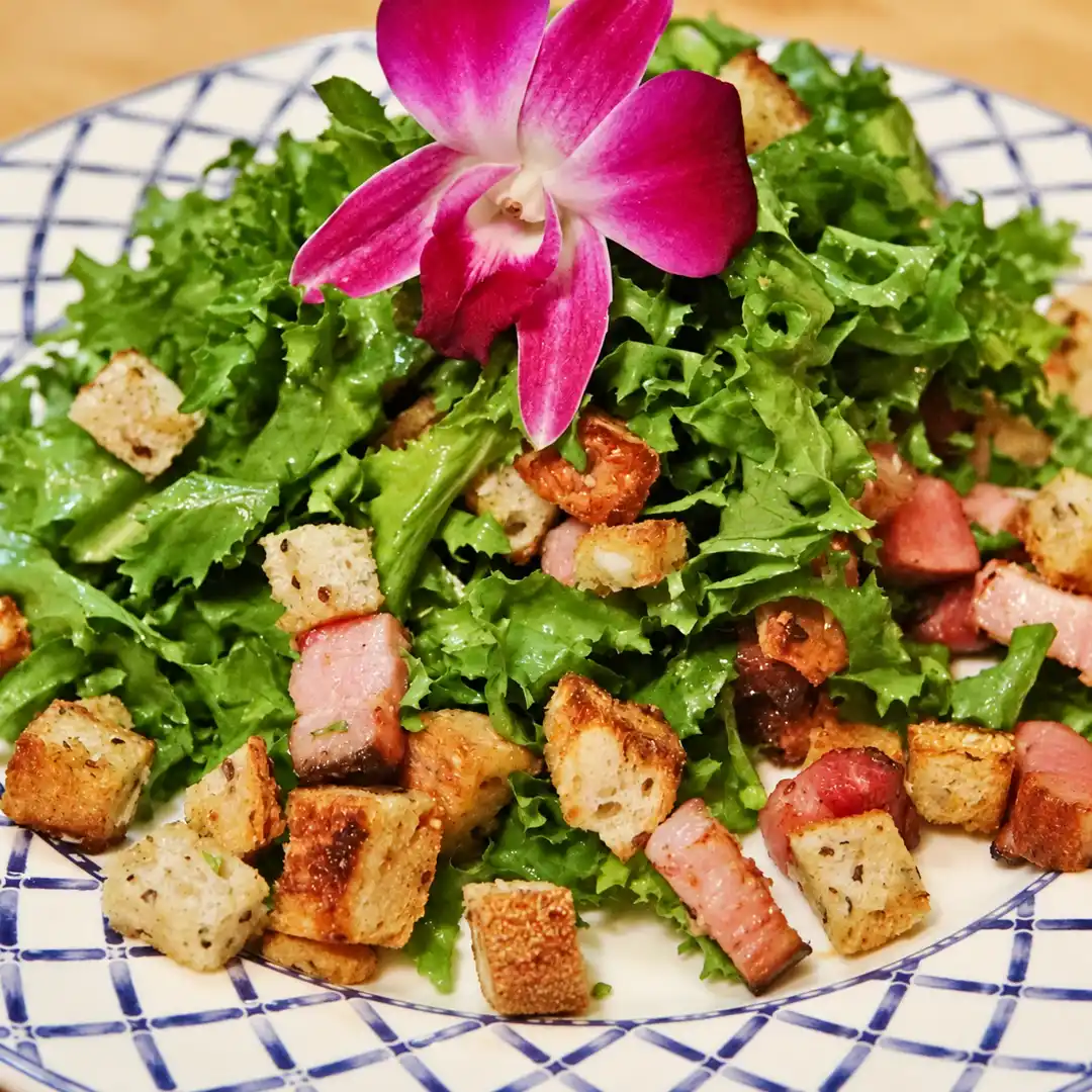 frisee salad bacon garlic croutons, finished dish