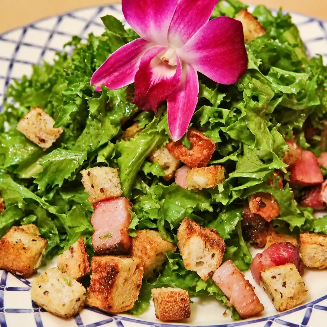 frisee salad bacon garlic croutons, finished dish