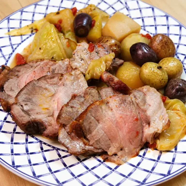 Pork Shoulder Roast with Cabbage and Root Vegetables