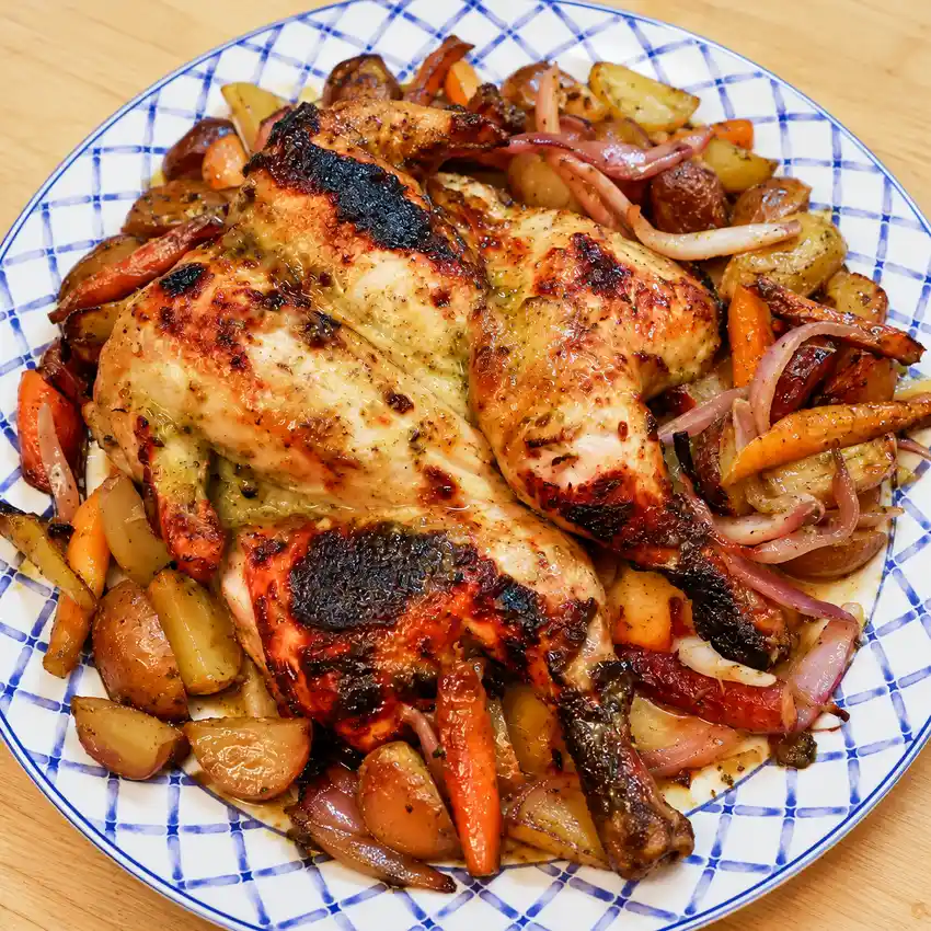 Poulet en crapaudine au miel moutarde et herbes avec légumes